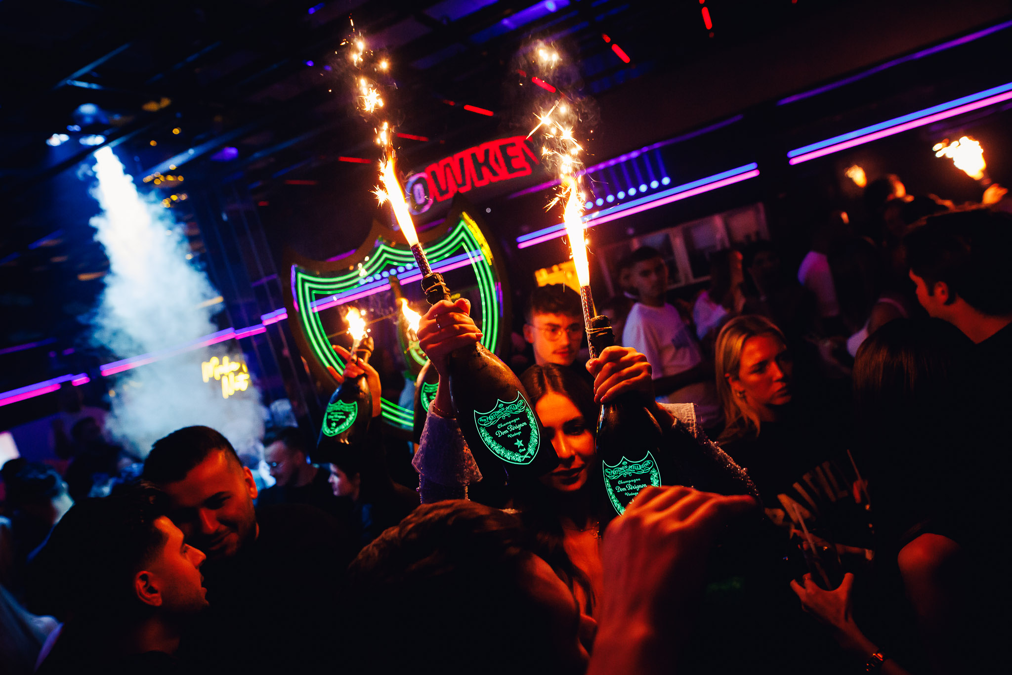 Sparklers and bottles on the dancefloor